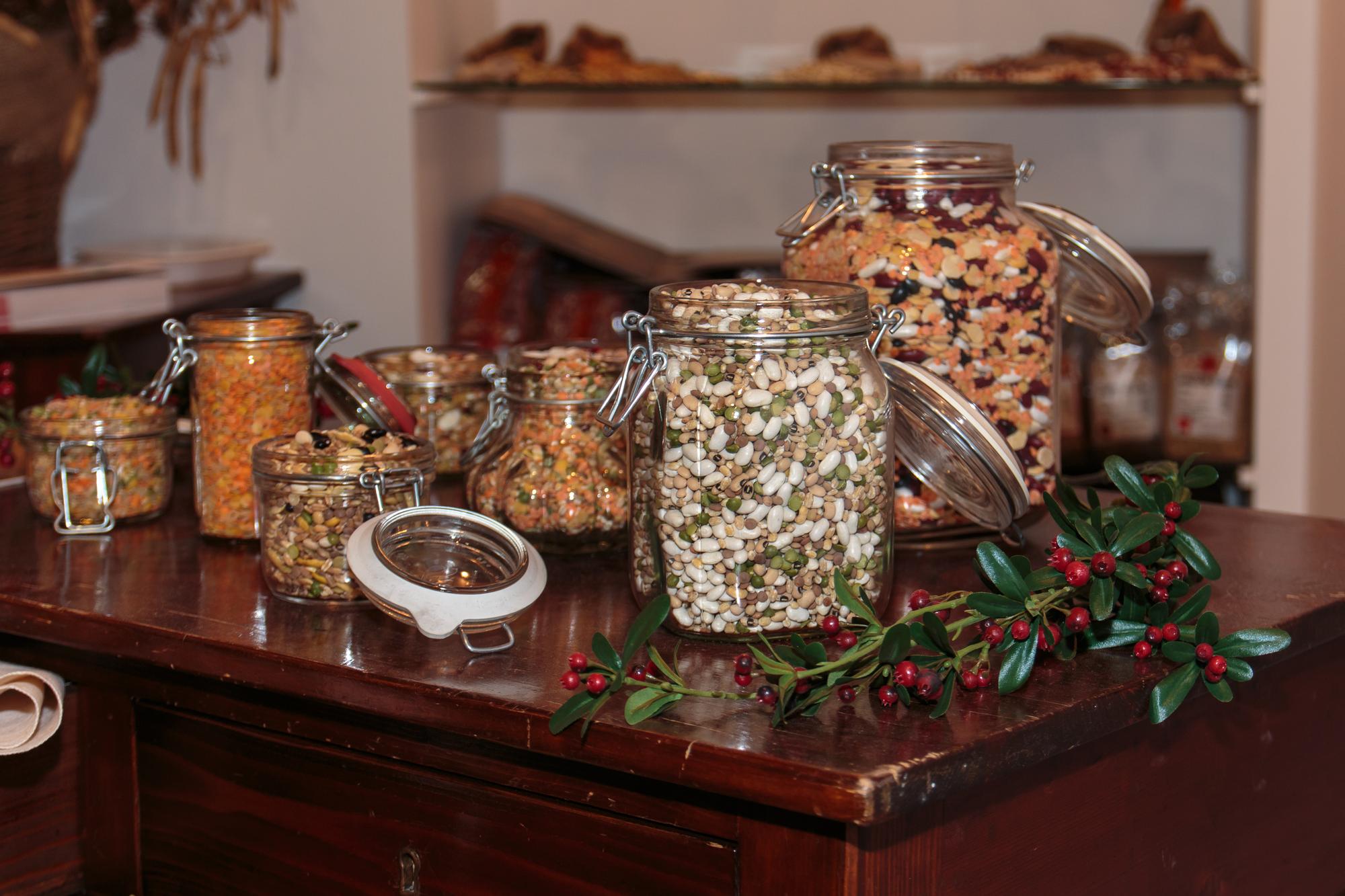 Local kitchen workspace with jars and herbs